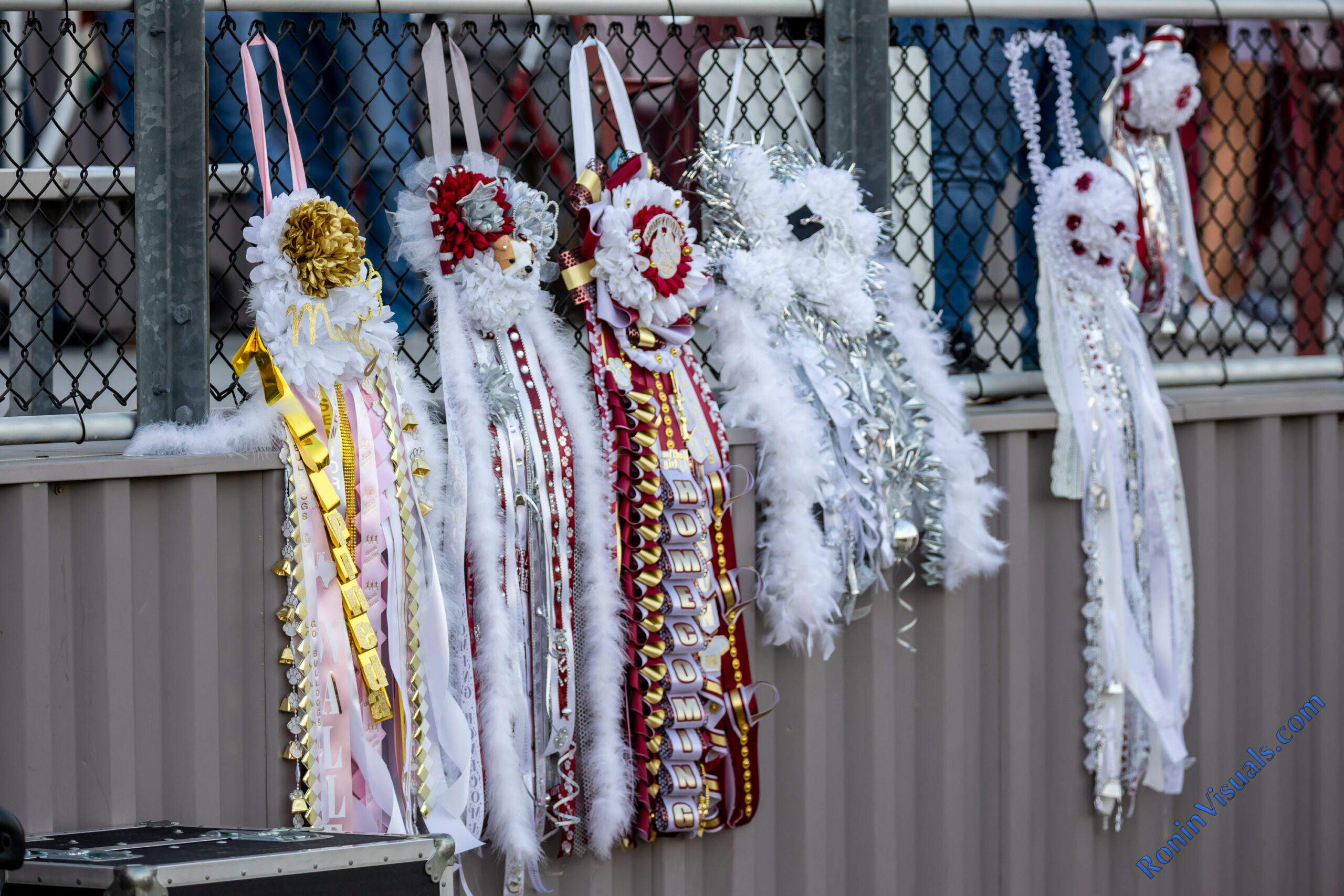 Each mum and garter can be as different as the colors of the rainbow, and that's to be expected as mums reflect every individual's personality. (courtesy RoninVisuals.com)